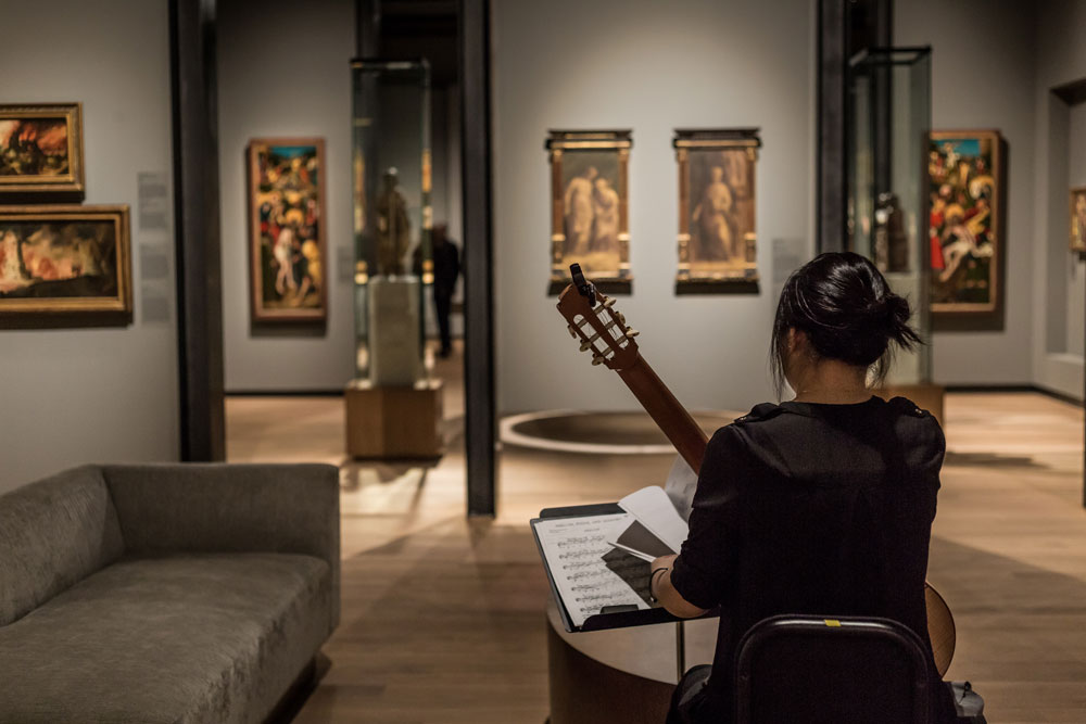 photo of a musician in an art gallery